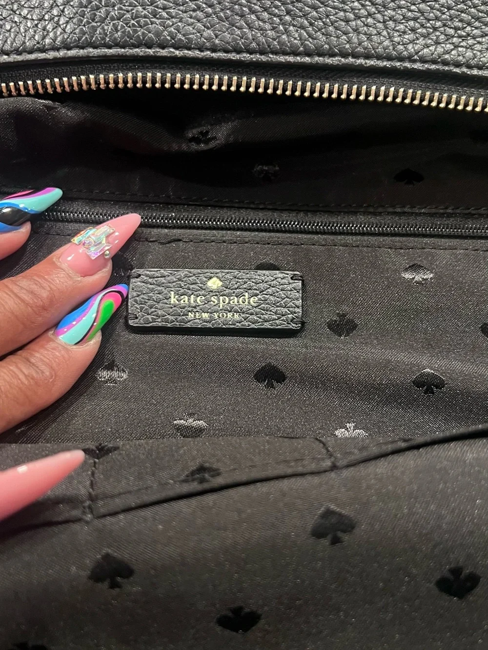 Kate Spade Black Pebbled Leather Backpack with Gold Accents